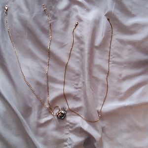 Two necklaces that were left in my grandmother's jewelry box along with to other